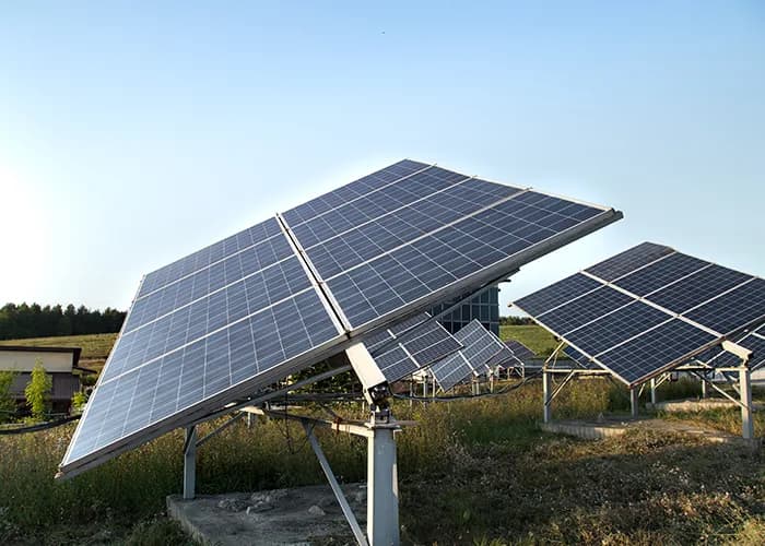 Rows of solar panels at a ground-mounted solar power plant